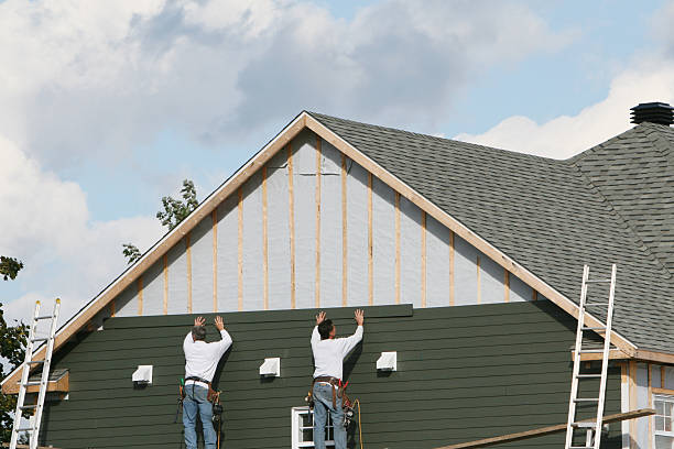Professional Siding technician working in Middle River, MD